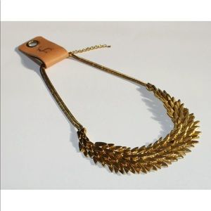 SOLD ::: Statement metal feather gold necklace